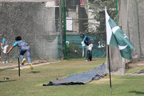 Pakistan team during a practice session with the flag seen on the right. Pic: PCB