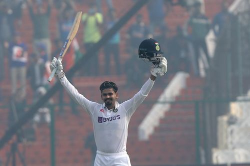 Shreyas Iyer soaks in the applause after reaching his hundred on Test debut. Pic: BCCI