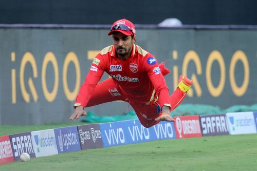 Deepak Hooda diving to save a boundary.