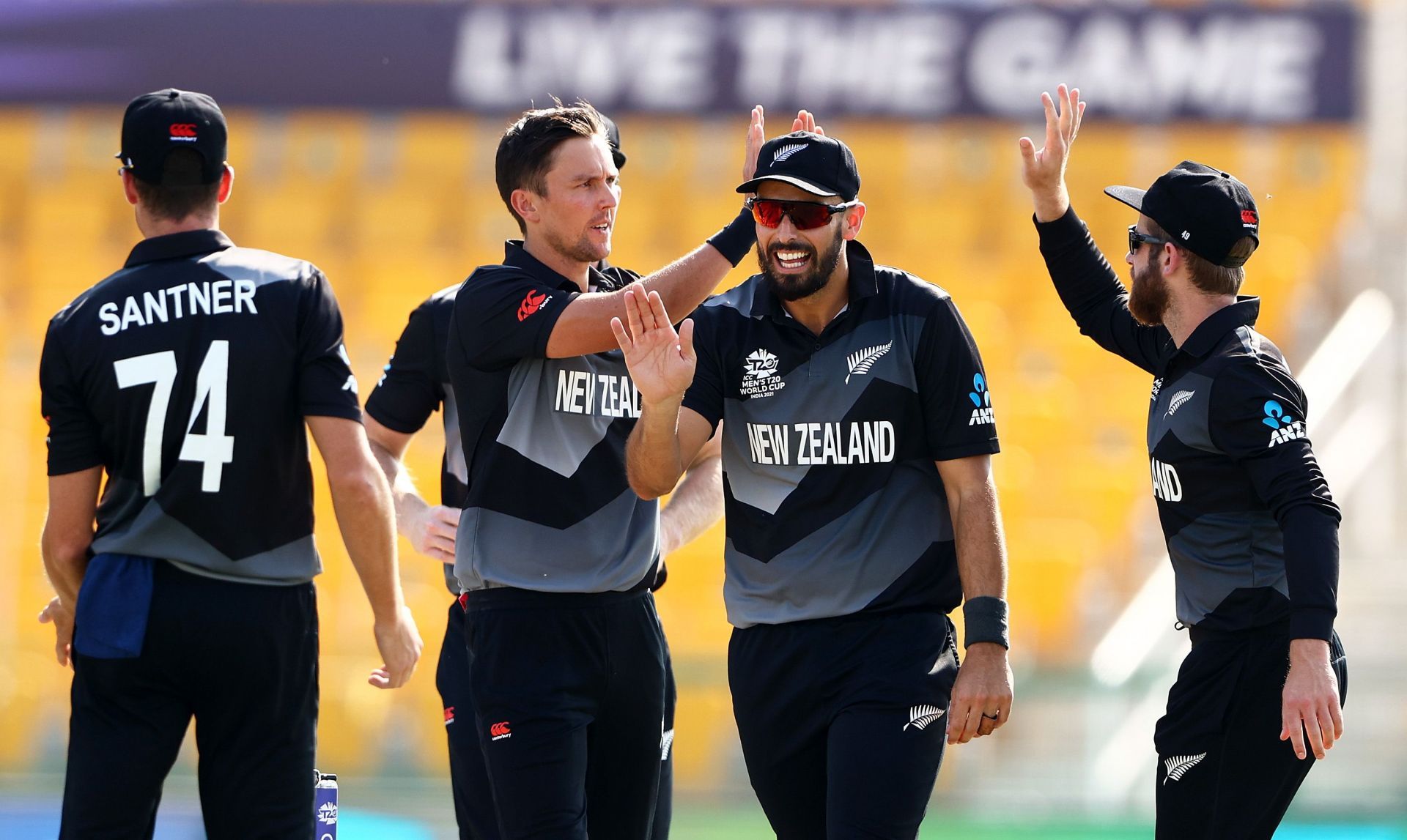 Trent Boult of New Zealand celebrates the wicket of Hazratullah Zazai with teammates. Pic: Getty Images