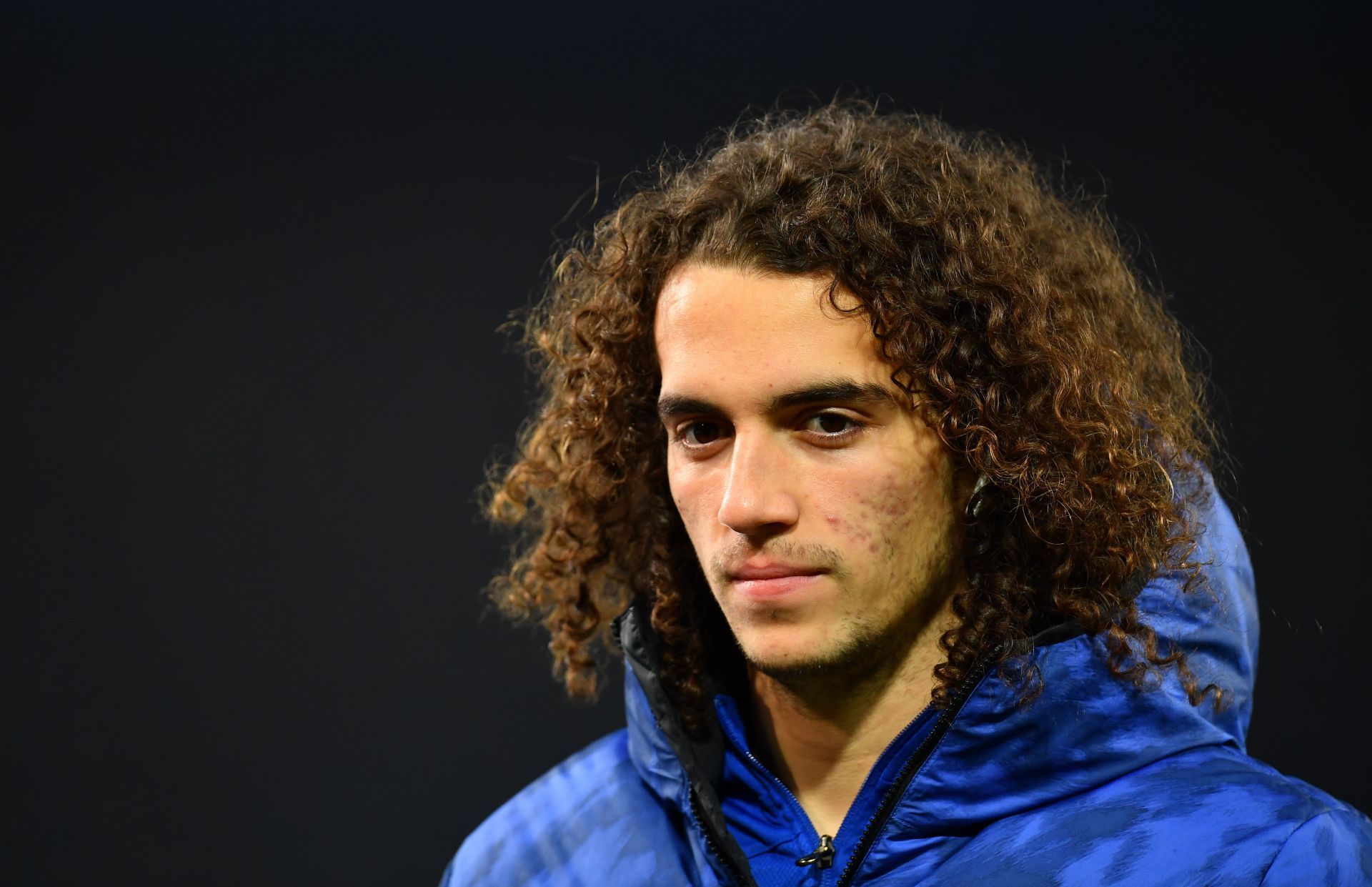 Matteo Guendouzi warms up before a league match.