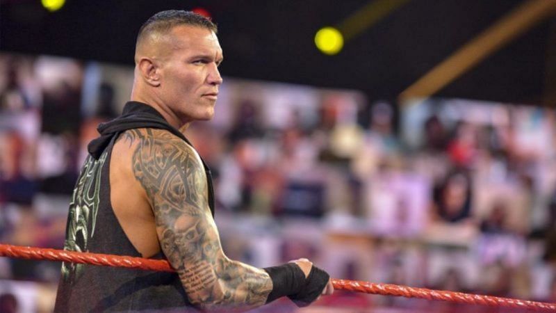 Randy Orton&#039;s skull tattoos are visible on both his arms