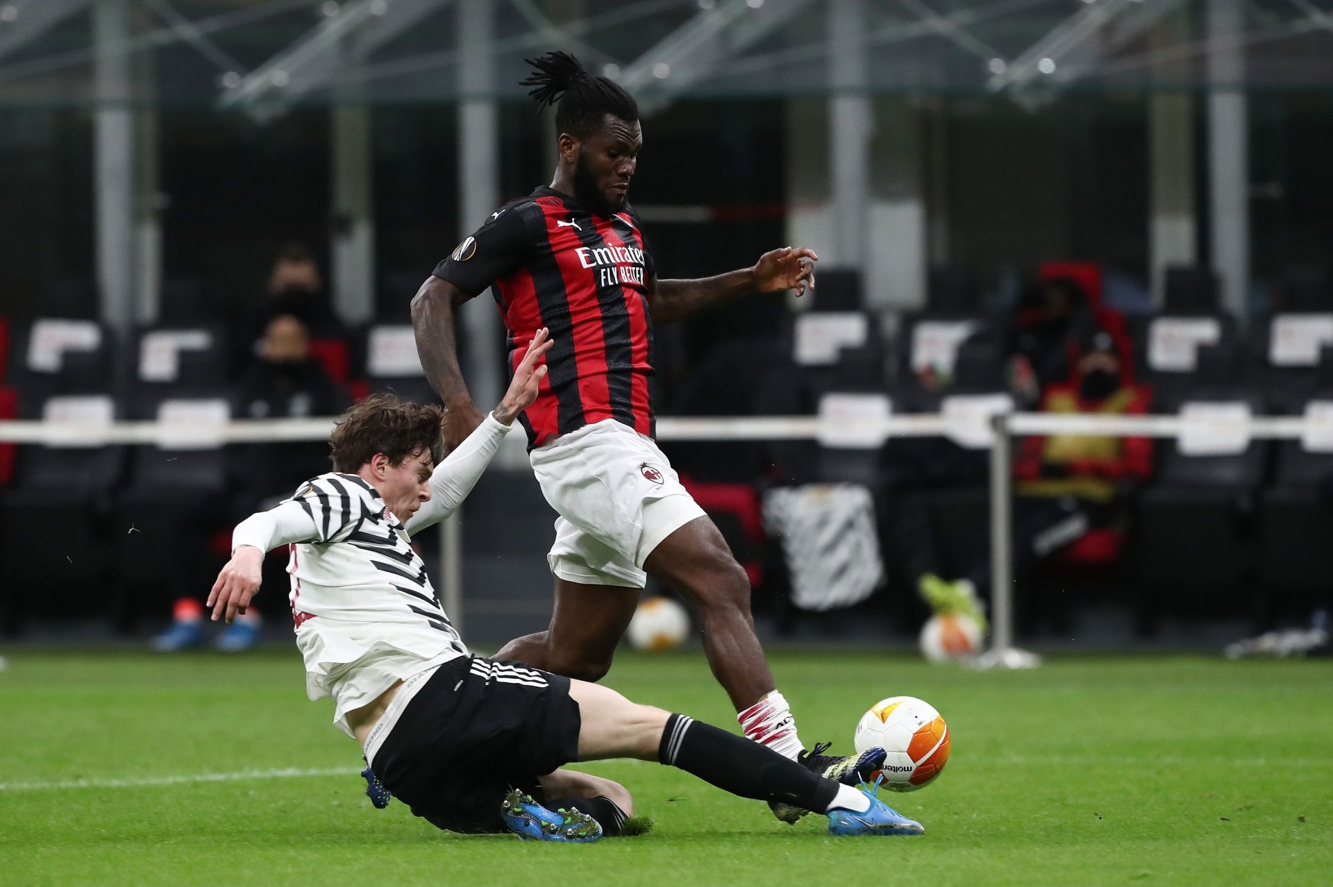Manchester United&#039;s Victor Lindelof tackles AC Milan&#039;s Franck Kessie in a Europa League game