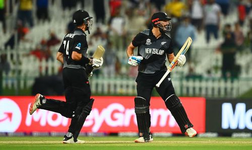 Daryl Mitchell celebrates with Mitchell Santner following New Zealand’s win over England. Pic: Getty Images