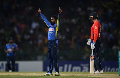 Sri Lanka's Amila Aponso (left) celebrating a wicket