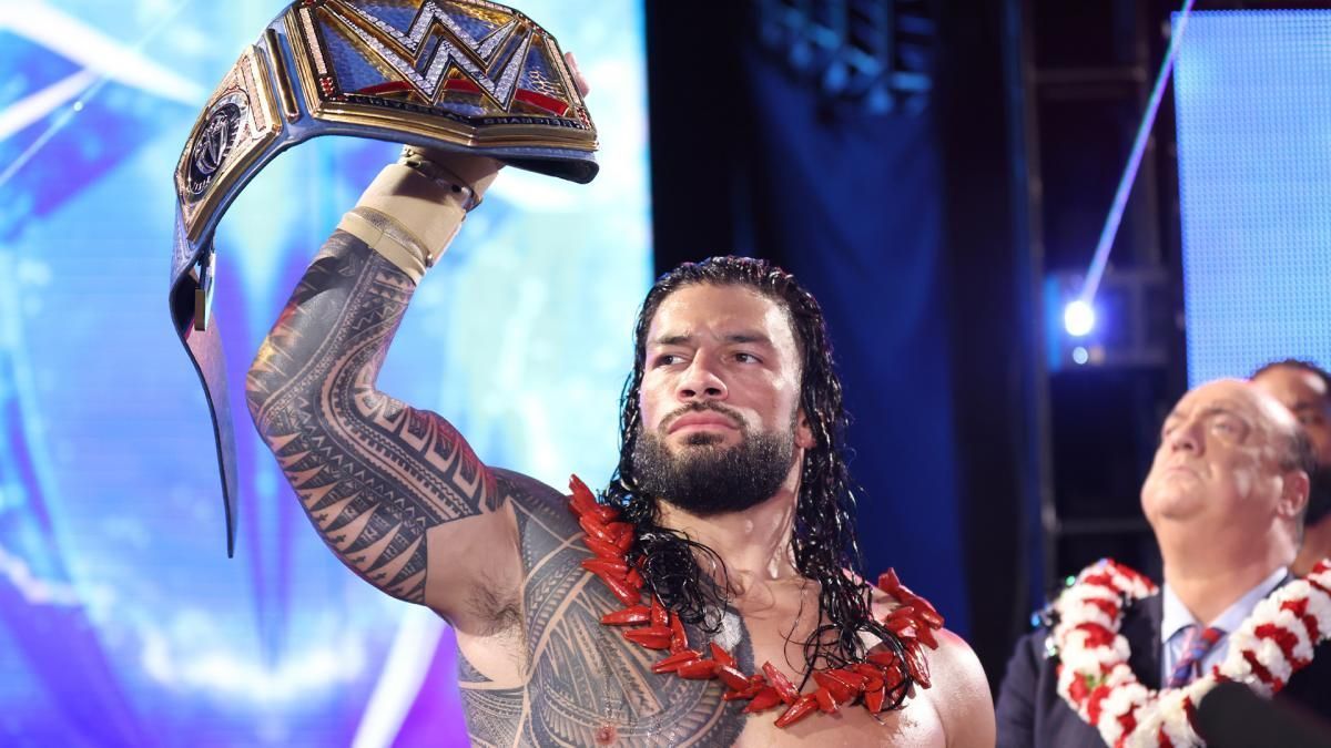 Roman Reigns, The Tribal Chief, raising his Universal Championship