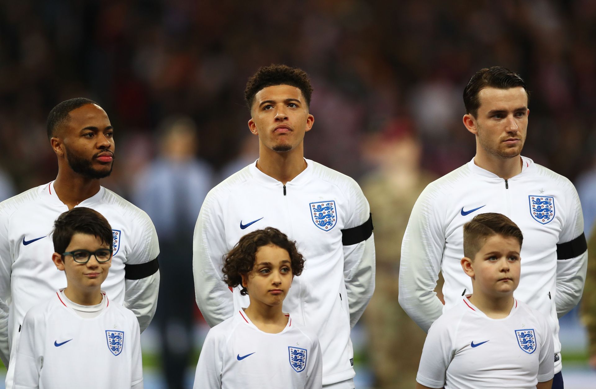 Raheem Sterling (left) and Jadon Sancho (centre) faced vile racist comments earlier this year.