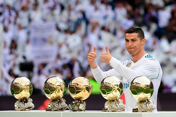 Cristiano Ronaldo displays his five Ballon d&#039;Or awards.
