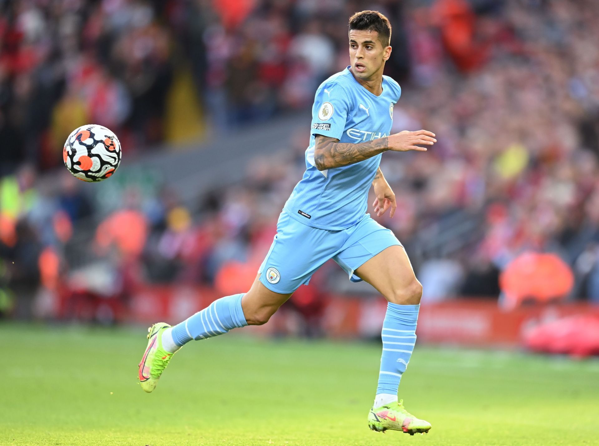 Joao Cancelo in action during Liverpool v Manchester City in the Premier League