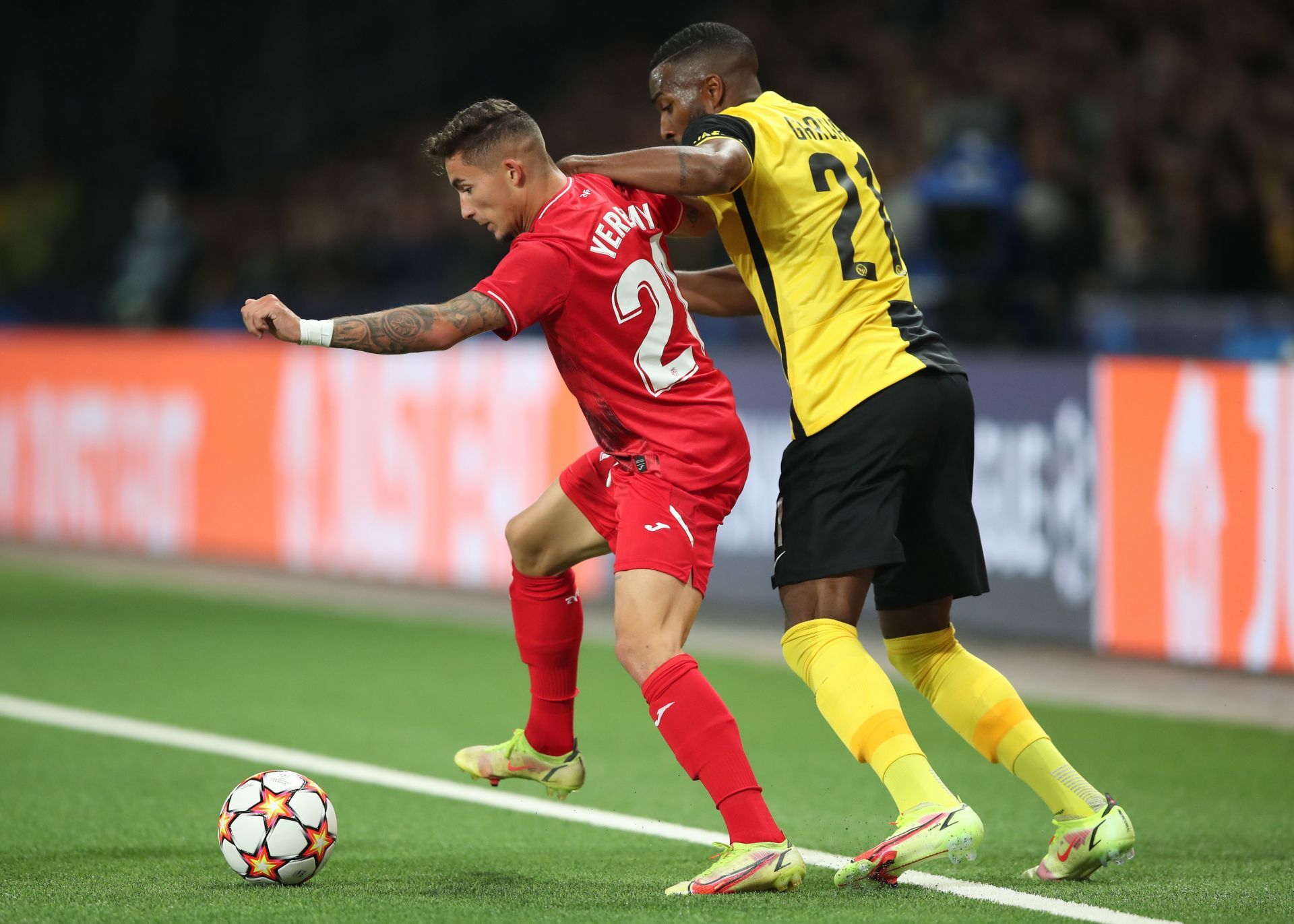 Yeremi Pino of Villarreal CF holds off Ulisses Garcia of BSC Young Boys