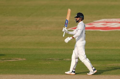 Shreyas Iyer acknowledges the applause after reaching his hundred on Test debut. Pic: BCCI