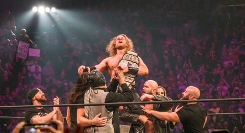 Hangman Adam Page gets shown some love from Cedric Alexander.