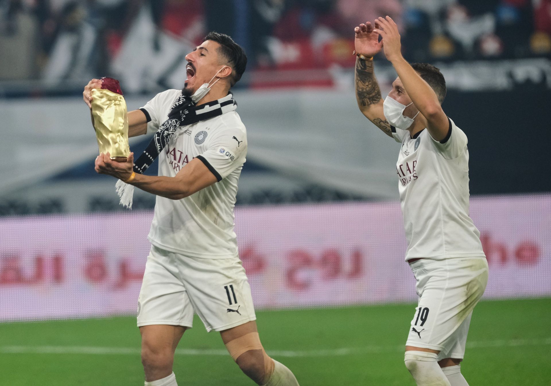 Baghdad Bounedjah and Santi Cazorla of Al Sadd