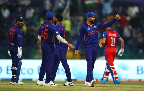 The Indian team celebrate during their victory over Afghanistan at the ICC Men's T20 World Cup 2021.