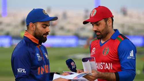 Former India ODI skipper Virat Kohli and Mohammad Nabi during T20 World Cup 2021. (PC: Getty)