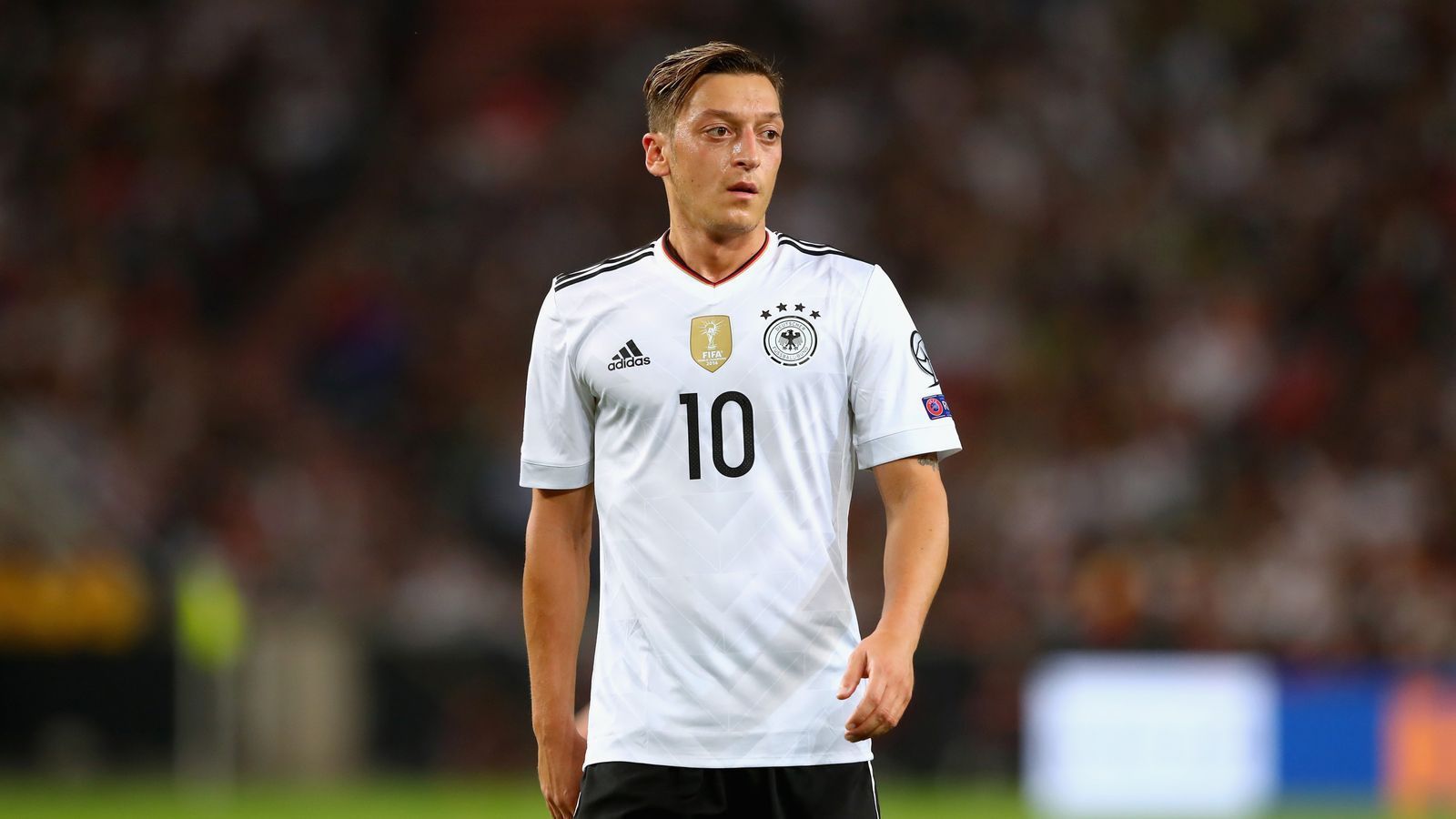 Mesut Ozil in action for Germany during a game.