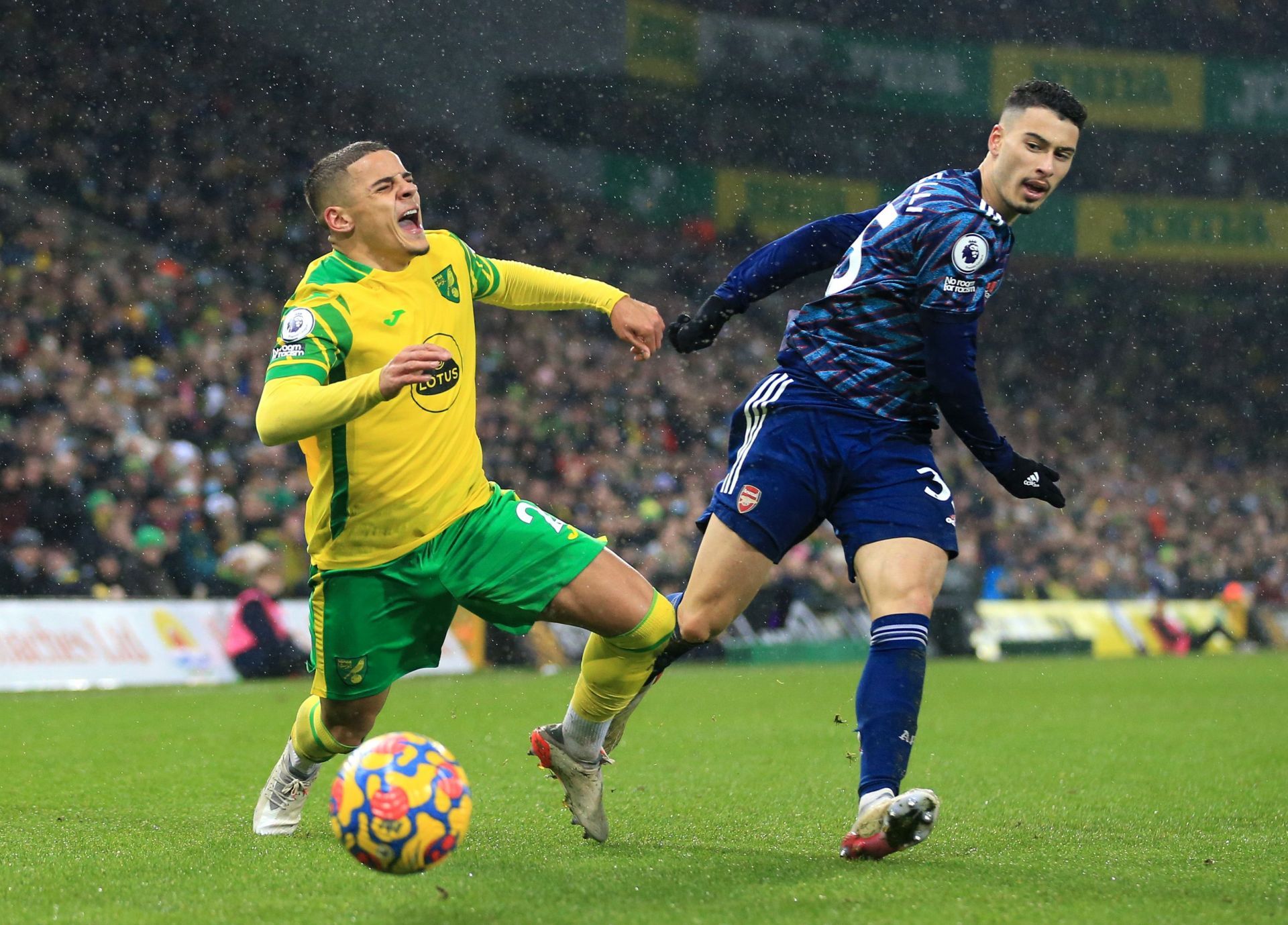 Max Aarons tussles it out with Gabriel Martinelli.