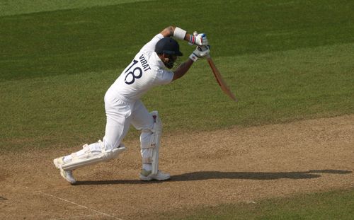 Virat Kohli drives the ball during a Test match. Pic: Getty Images