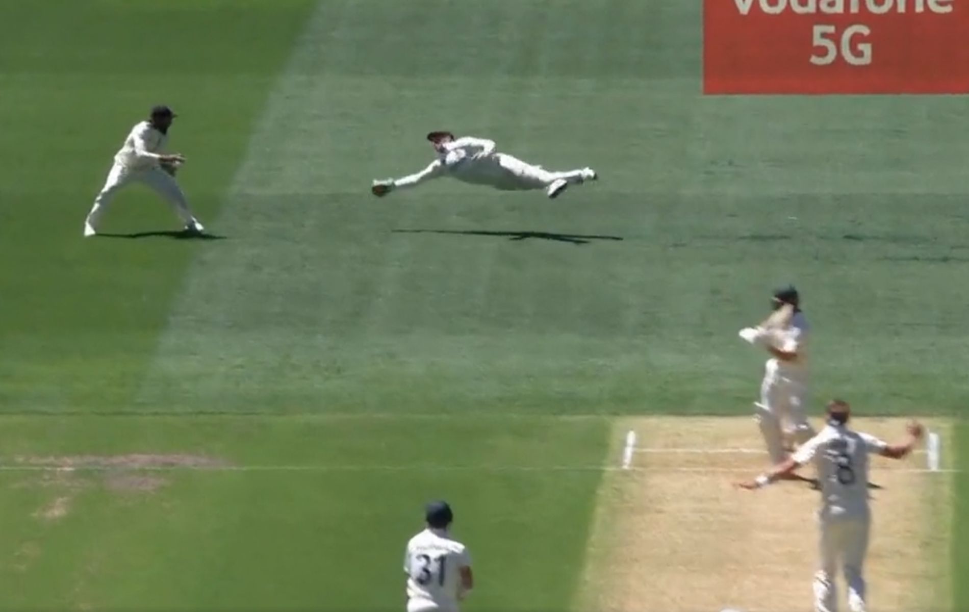 Ashes 2021-22: Jos Buttler took a one-handed blinder diving to his right to get rid of Marcus Harris.