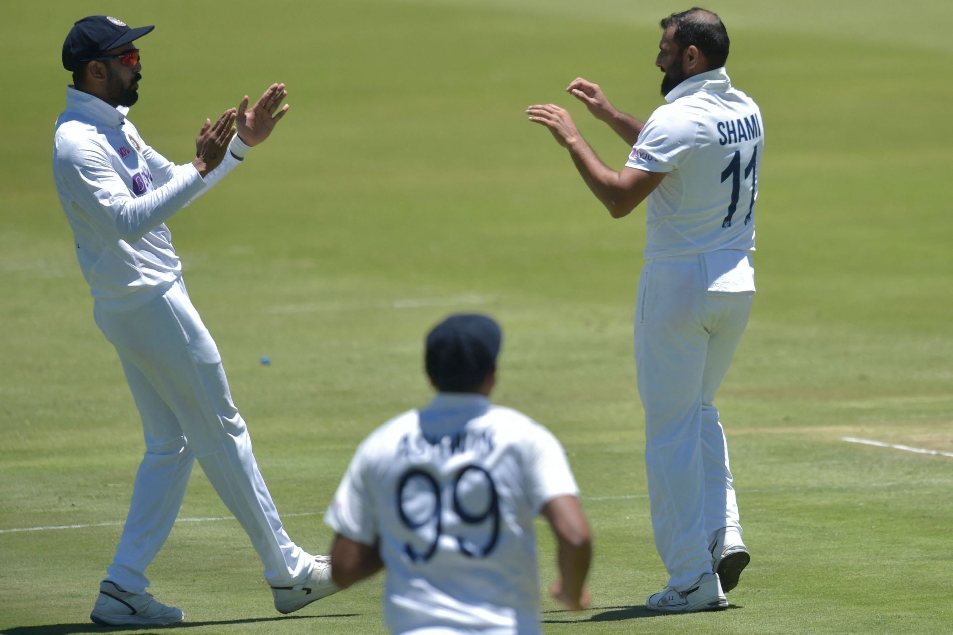 Mohammed Shami (right) celebrates one of his five wickets. Pic: ICC