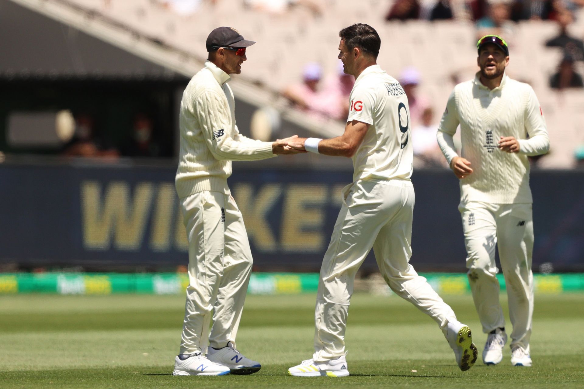 James Anderson celebrates with Joe Root after dismissing Steve Smith at the MCG.