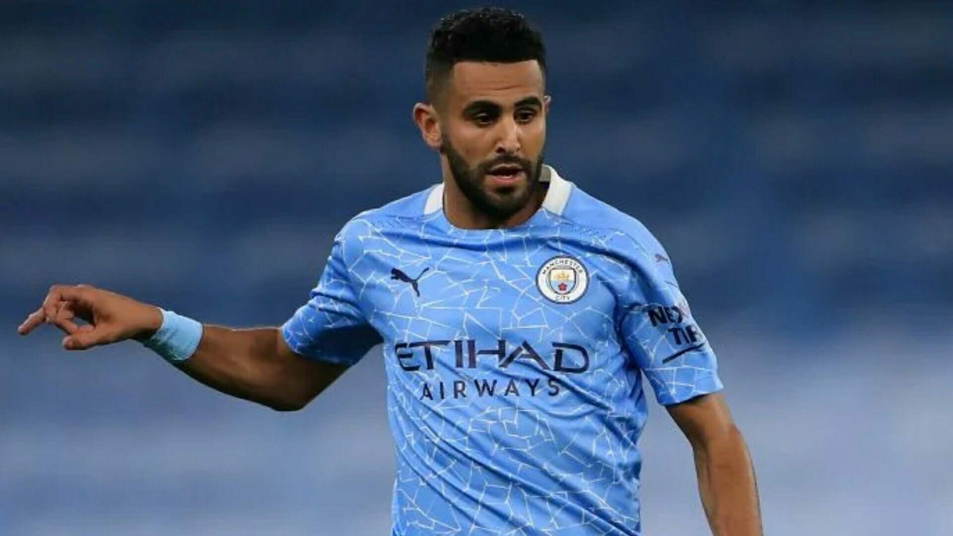 Riyad Mahrez in action for Manchester City in the Premier League