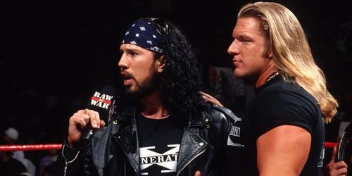 WWE Hall of Famers X-Pac (left) with Triple H (right)