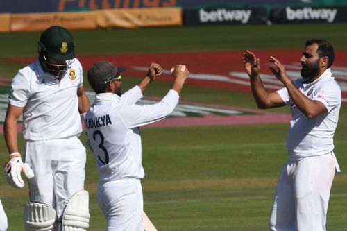 Mohammed Shami (right) celebrates the wicket of Wiaan Mulder. Pic: Getty Images