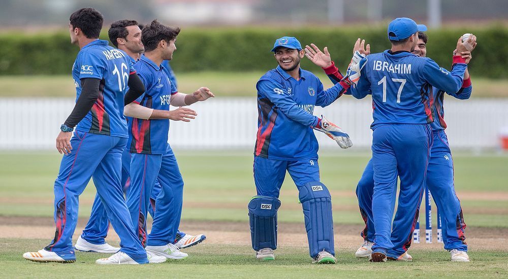 The Afghanistan U19 cricket team in action