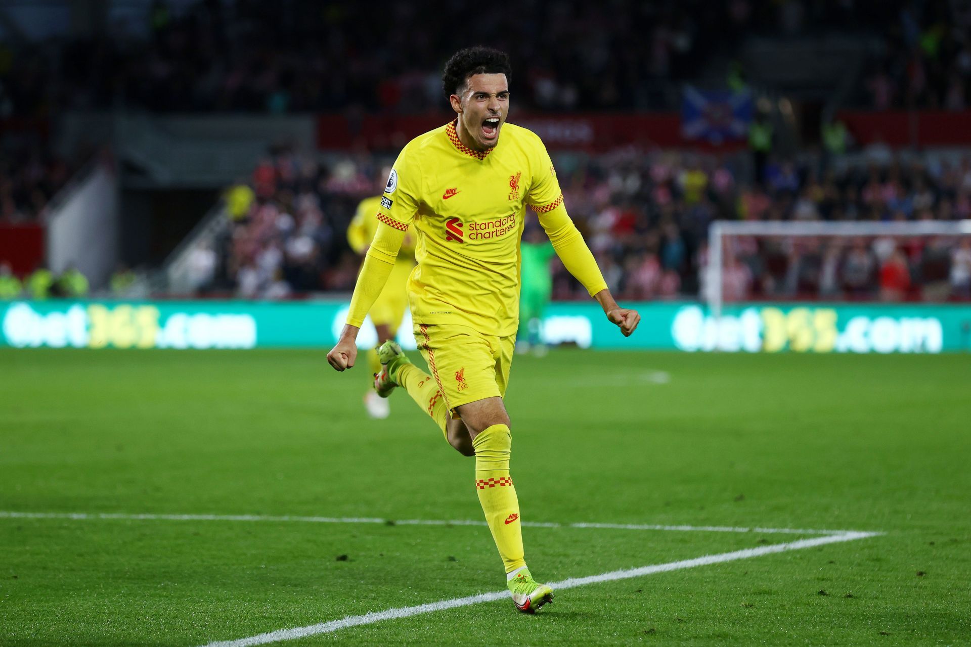 Curtis Jones celebrates scoring for Liverpool against Brentford.