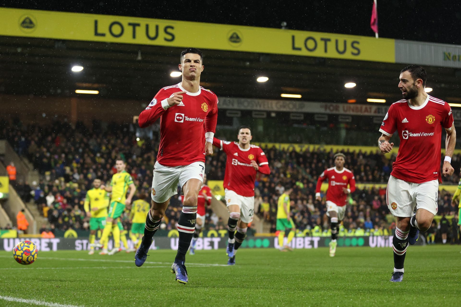 Cristiano Ronaldo (left) celebrates scoring Manchester United&#039;s winner against Norwich City