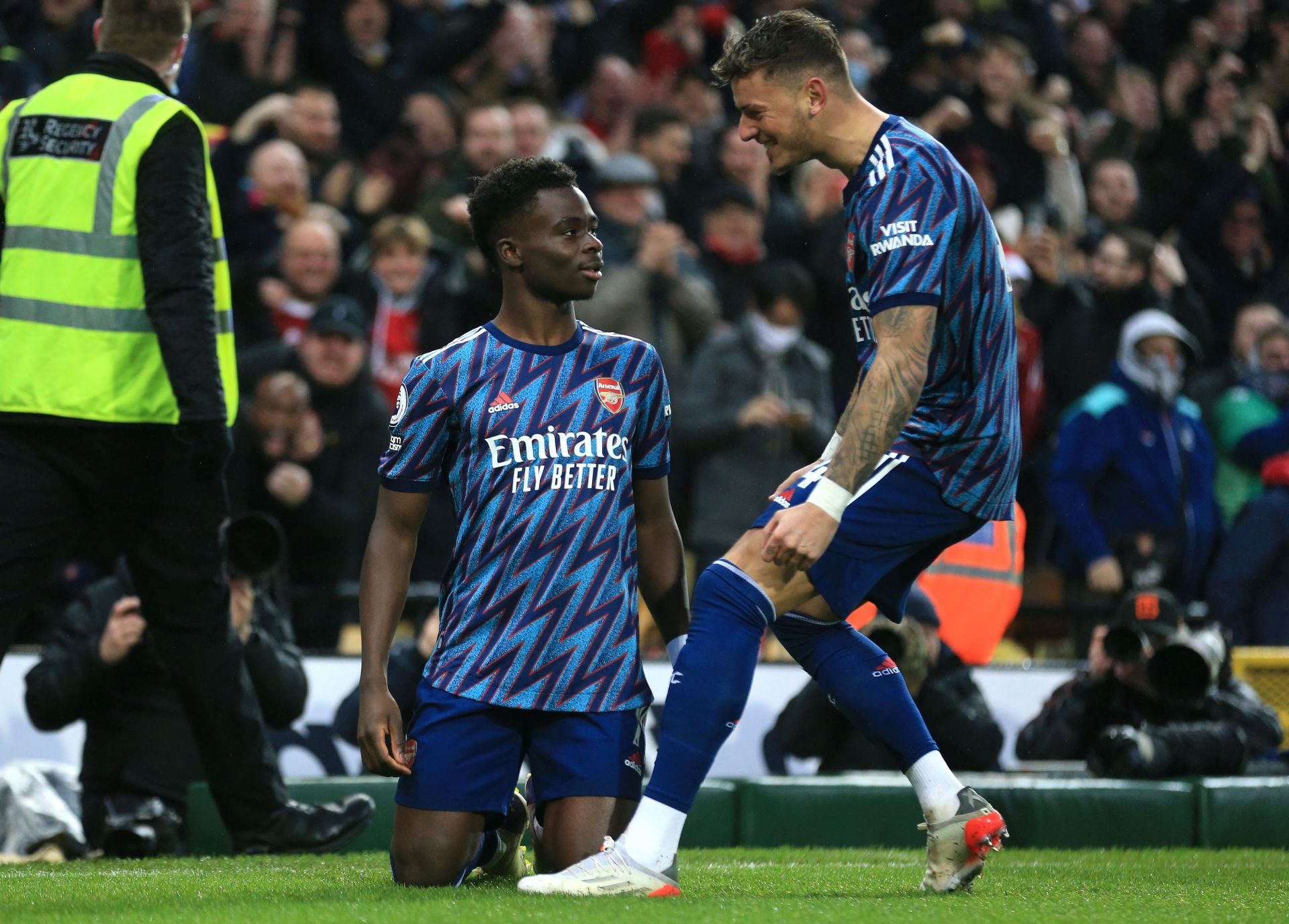 Bukayo Saka celebrates after scoring a goal.