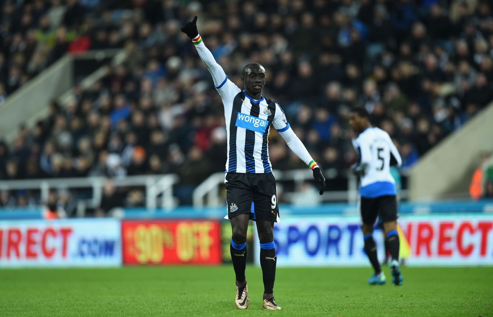 Newcastle player Papiss Cisse reacts during the Barclays Premier League match between Newcastle United and Liverpool at St James' Park on December 6, 2015 in Newcastle, England.