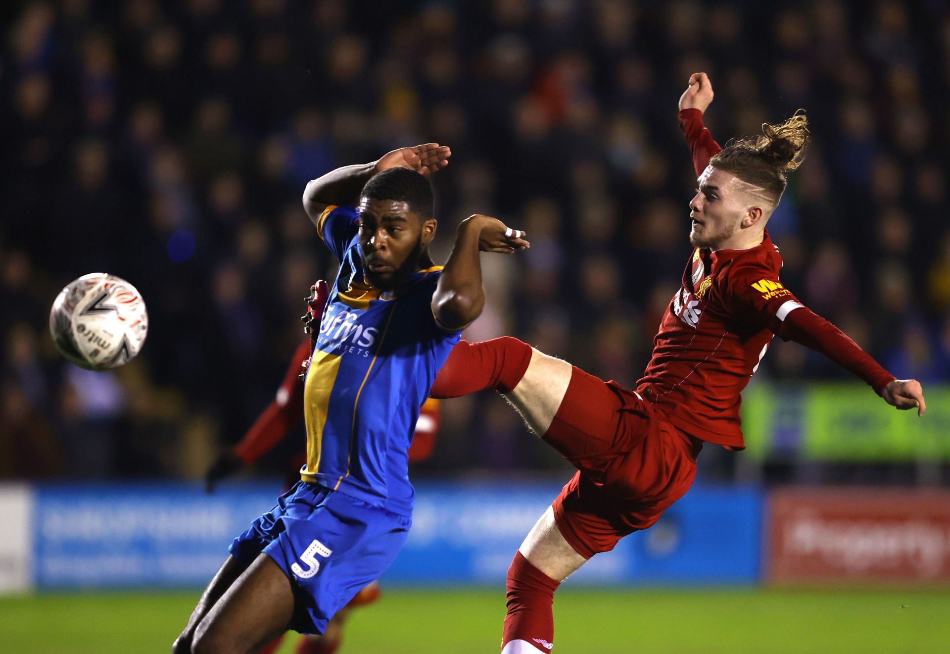 Harvey Elliot (right) in FA Cup action for Liverpool
