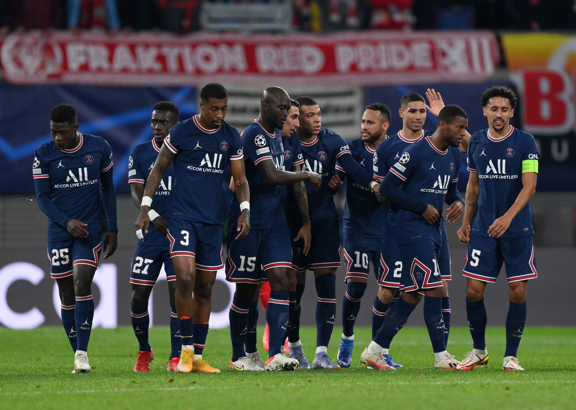 Paris Saint-Germain players react during a UEFA Champions League fixture.