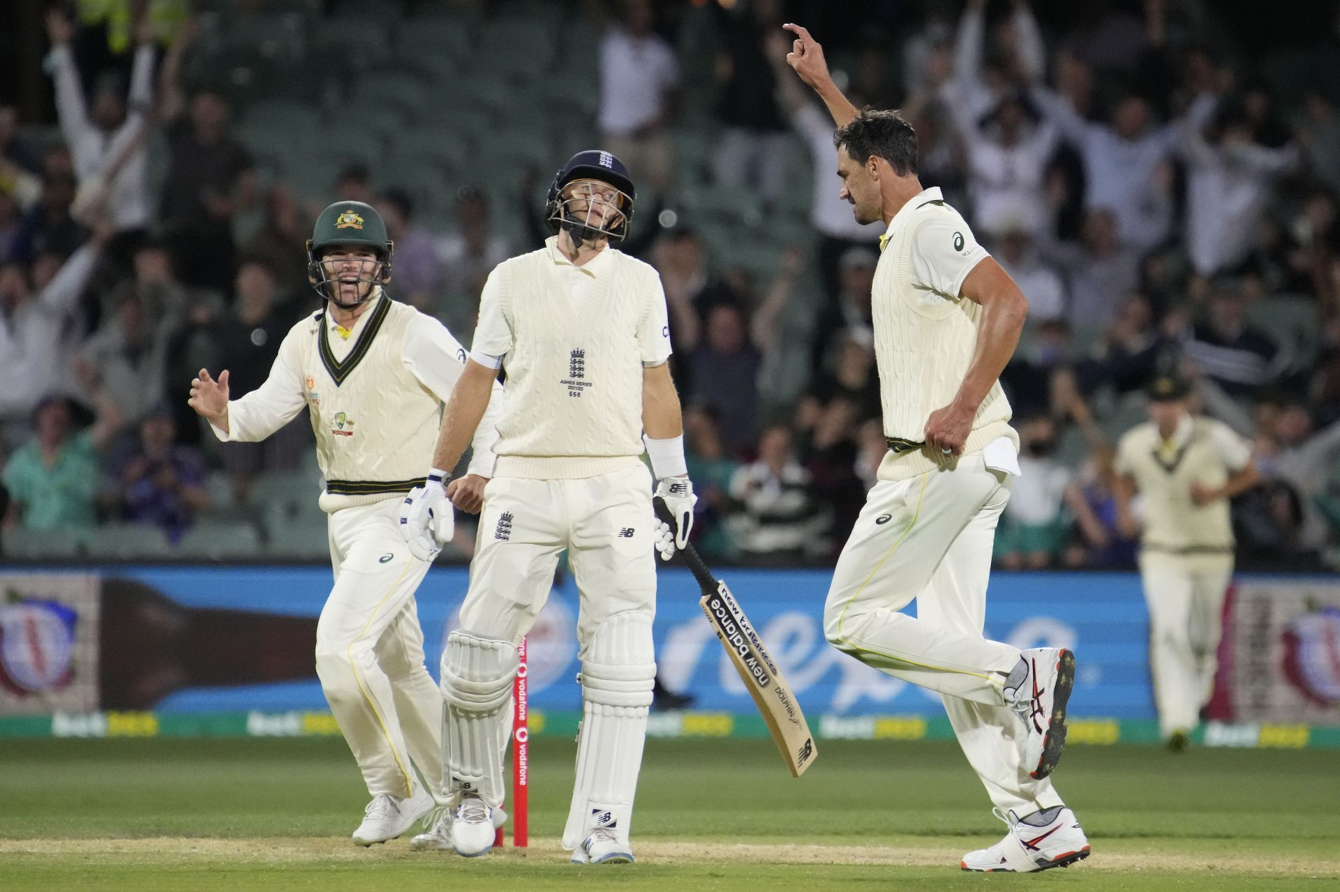 Mitchell Starc celebrates after taking the wicket of Joe Root. Pic: Getty Images