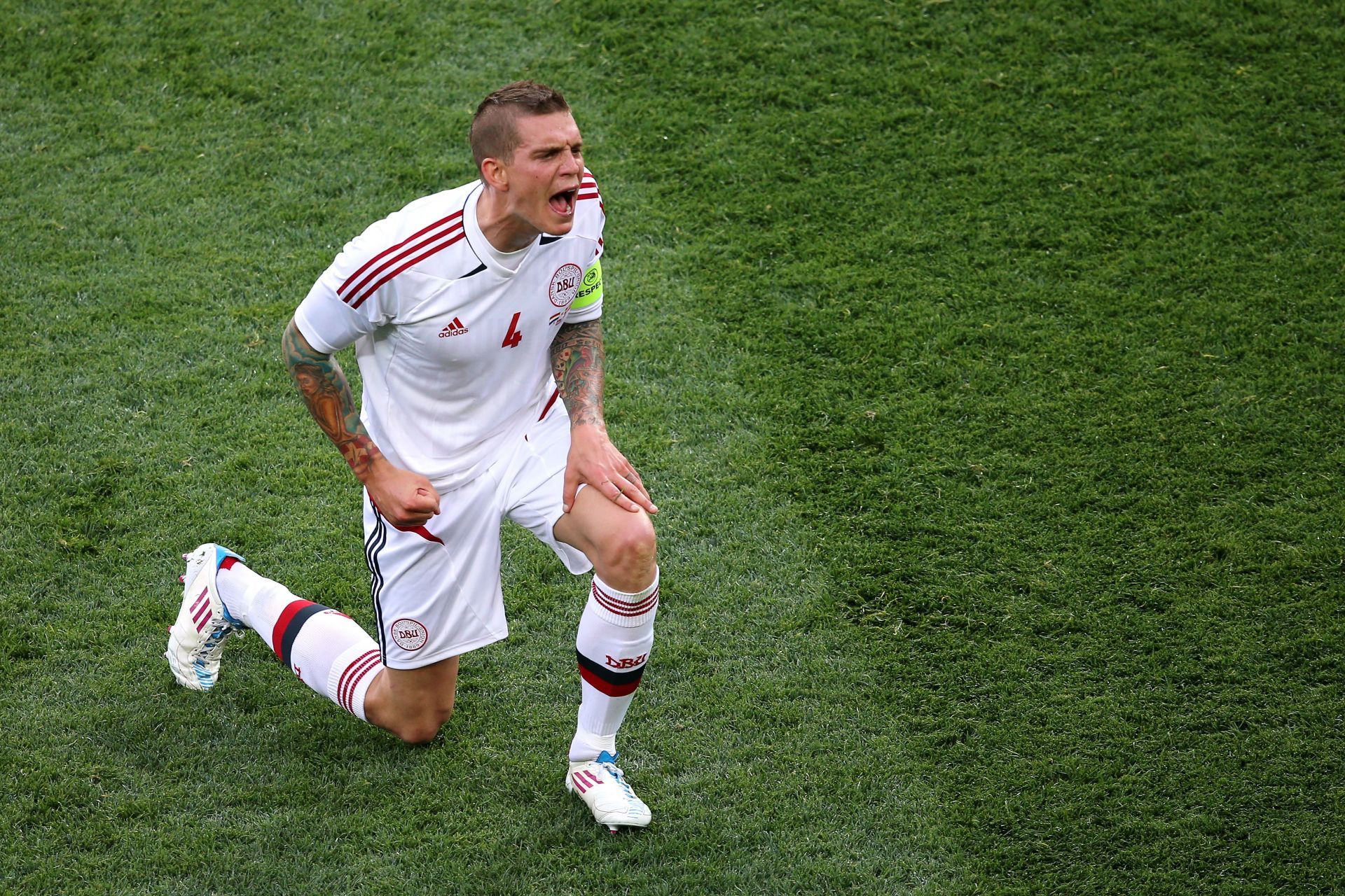 Former football player, Daniel Agger of Denmark reacts during the UEFA EURO 2012 group B match between Netherlands and Denmark at Metalist Stadium on June 9, 2012 in Kharkov, Ukraine.