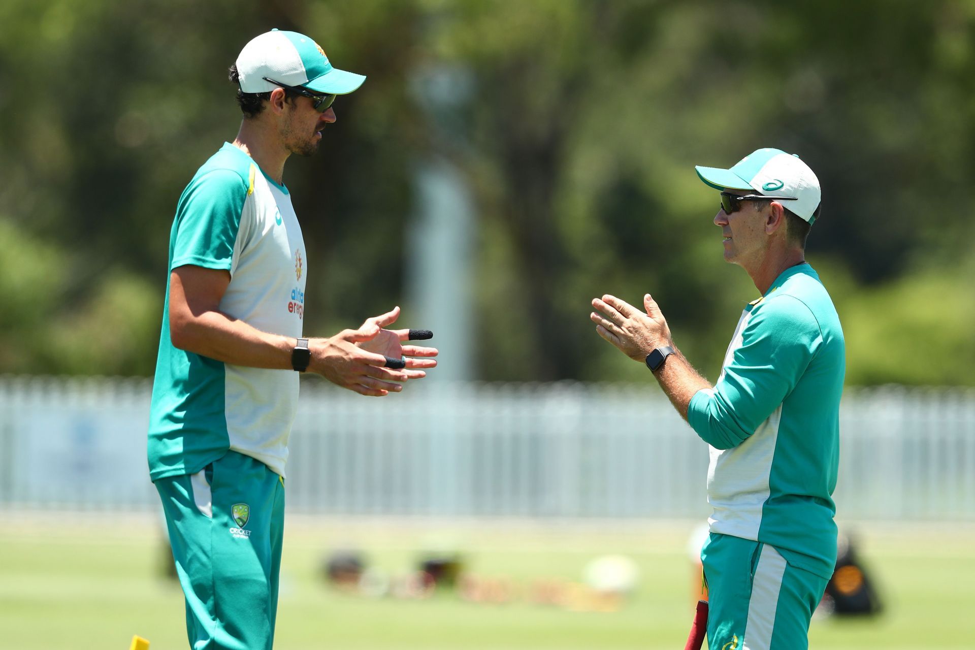 Mitchell Starc (left) and coach Justin Langer during an Australian training session Pic: Getty Images