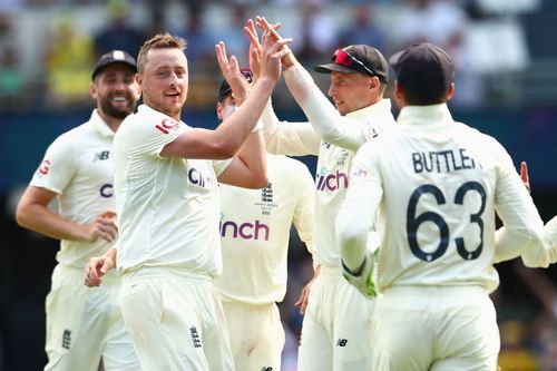 Ollie Robinson celebrates the wicket of Cameron Green.