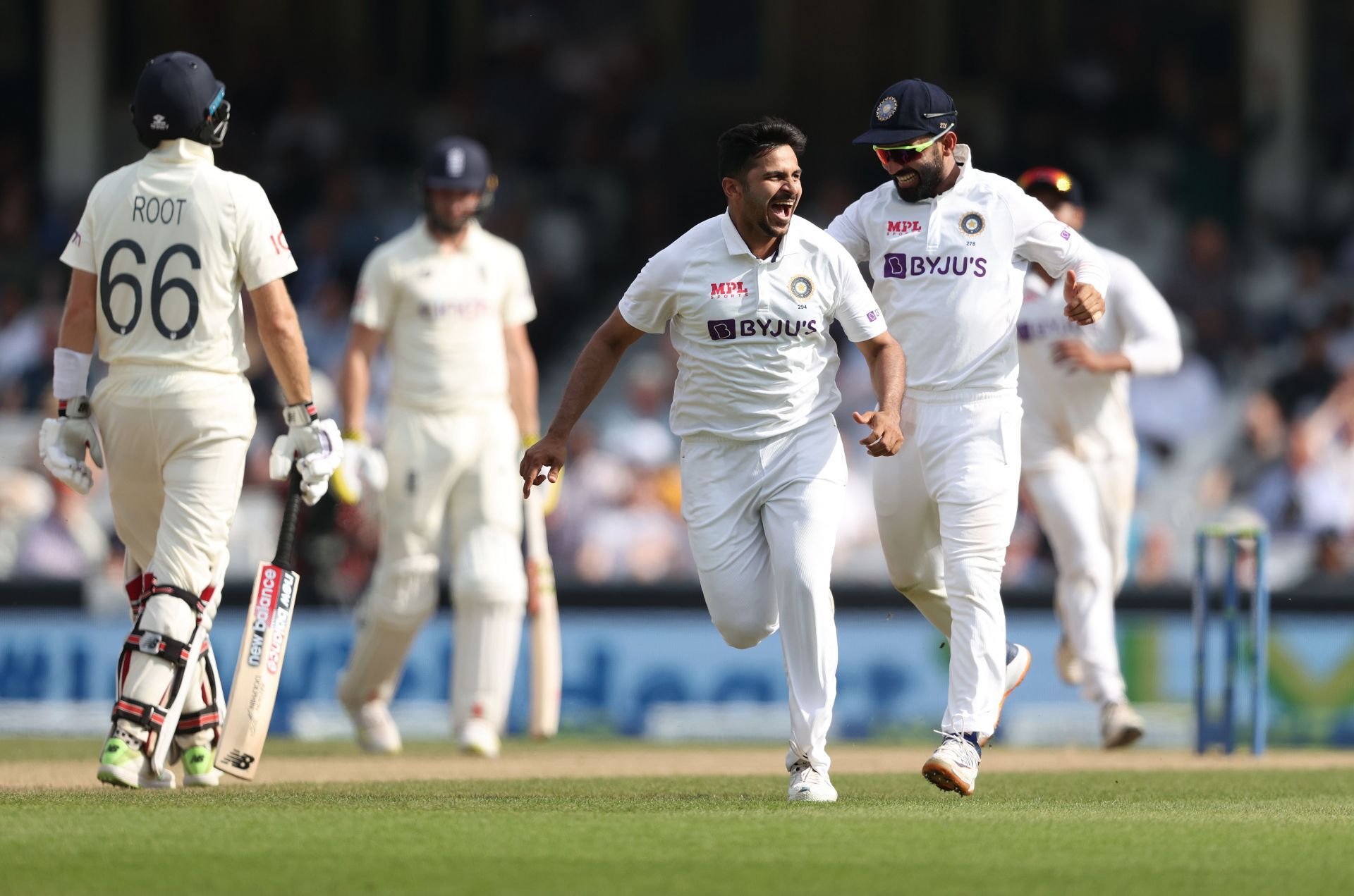 Shardul Thakur celebrates the wicket of Joe Root during the fourth Test against England on Day Five.