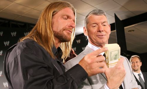 Triple H (left) and Vince McMahon (right)