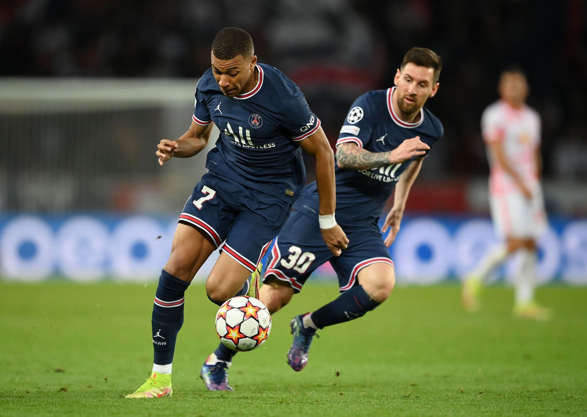 Paris Saint-Germain&#039;s Kylian Mbappe and Lionel Messi