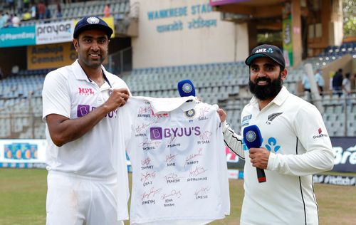 Ravichandran Ashwin presented Ajaz Patel with a jersey signed by the entire Indian team.