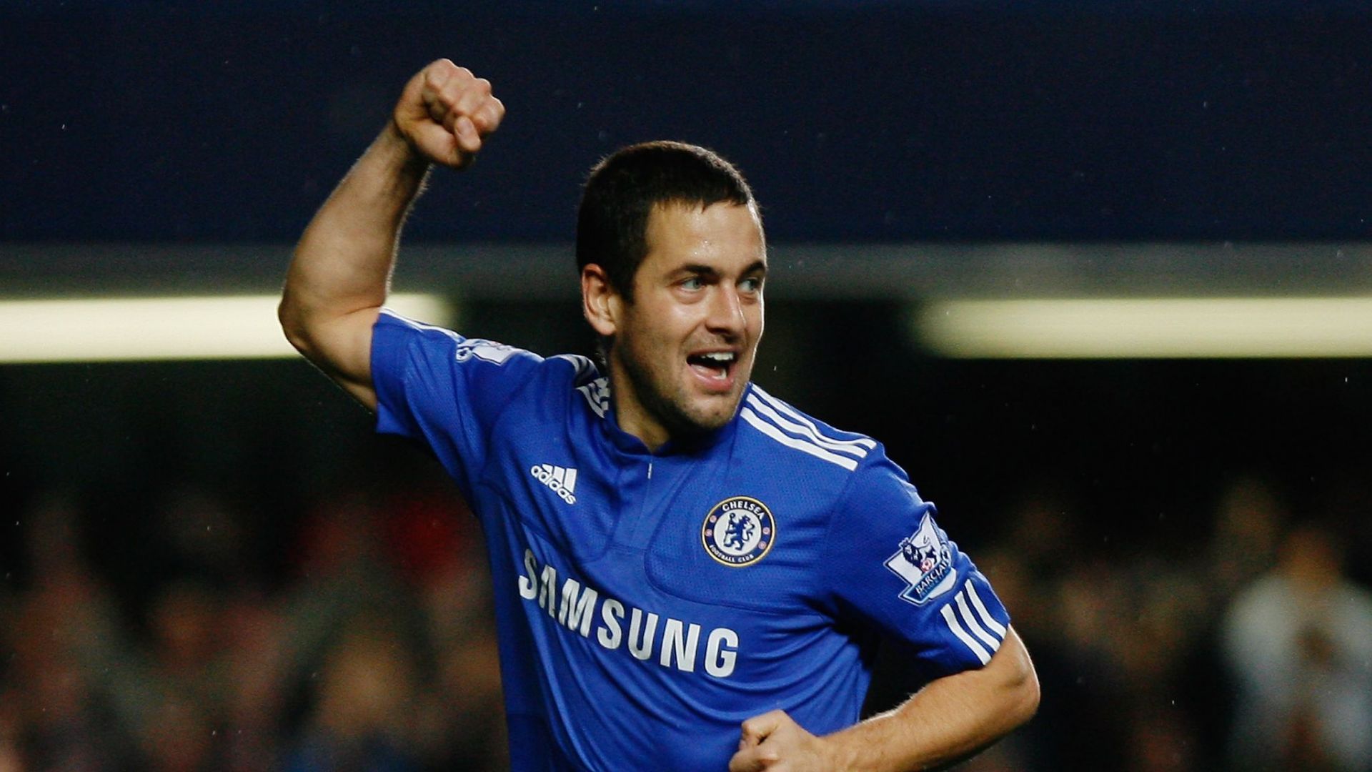 Joe Cole celebrating scoring a goal for Chelsea in a Premier League game