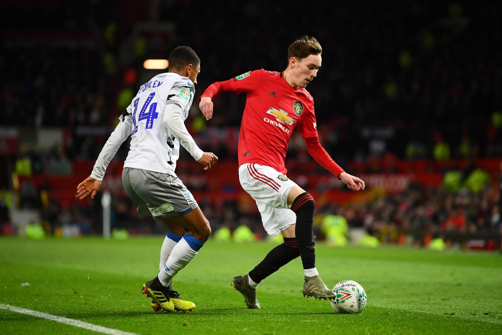 Manchester United&#039;s James Garner (right) in action during the Carabao Cup