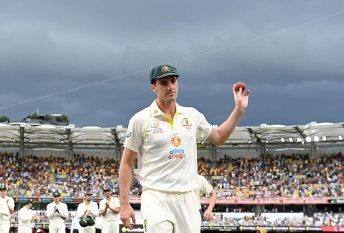 Pat Cummins leads his team out on captaincy debut.