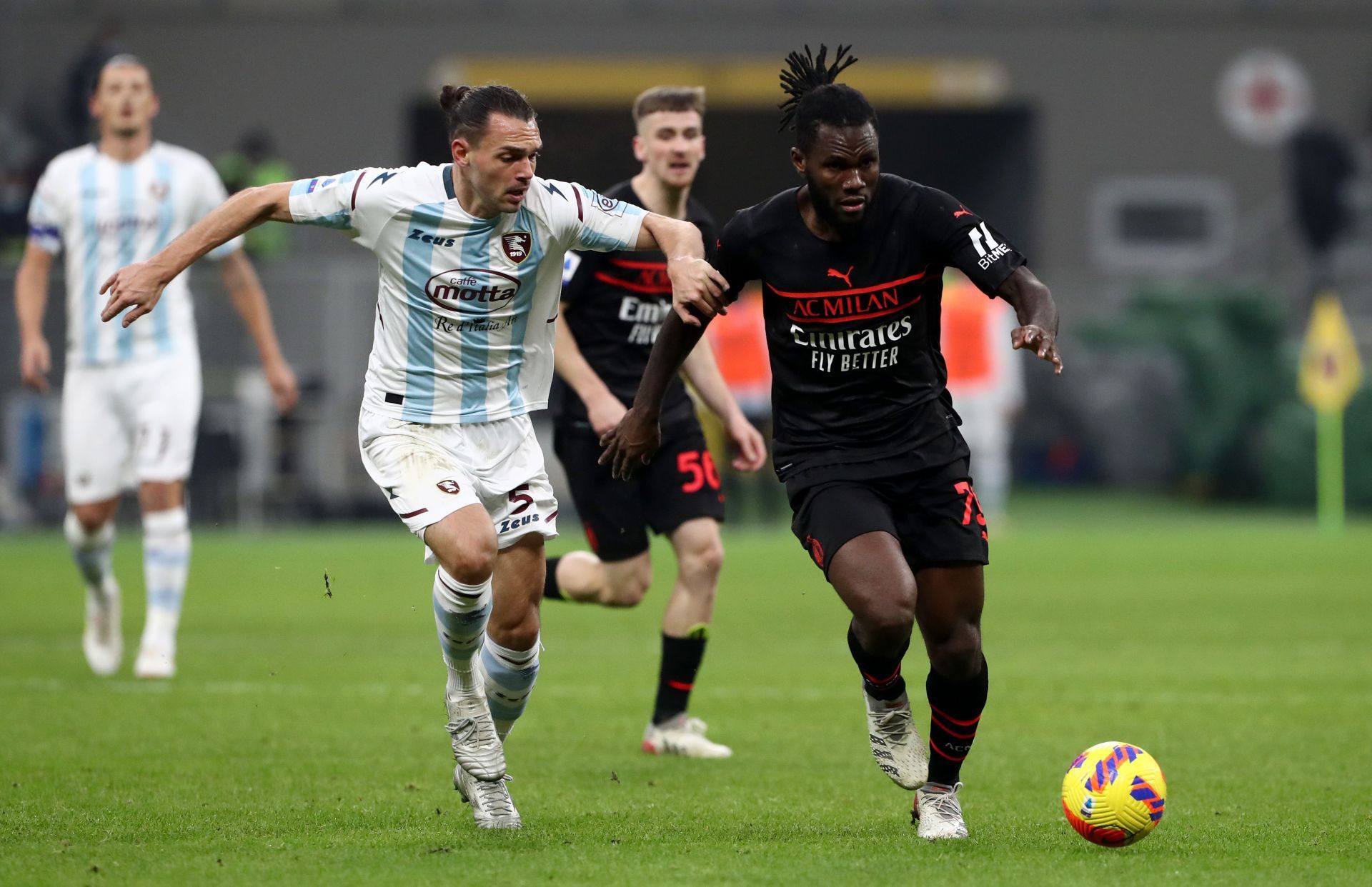 Thomas Kessie (right) in action for AC Milan.