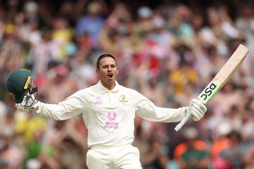 Usman Khawaja celebrates his century 