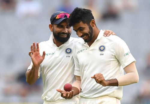 Jasprit Bumrah (R) and Mohammed Shami (L) shared seven wickets between them to help India gain a 13-run lead