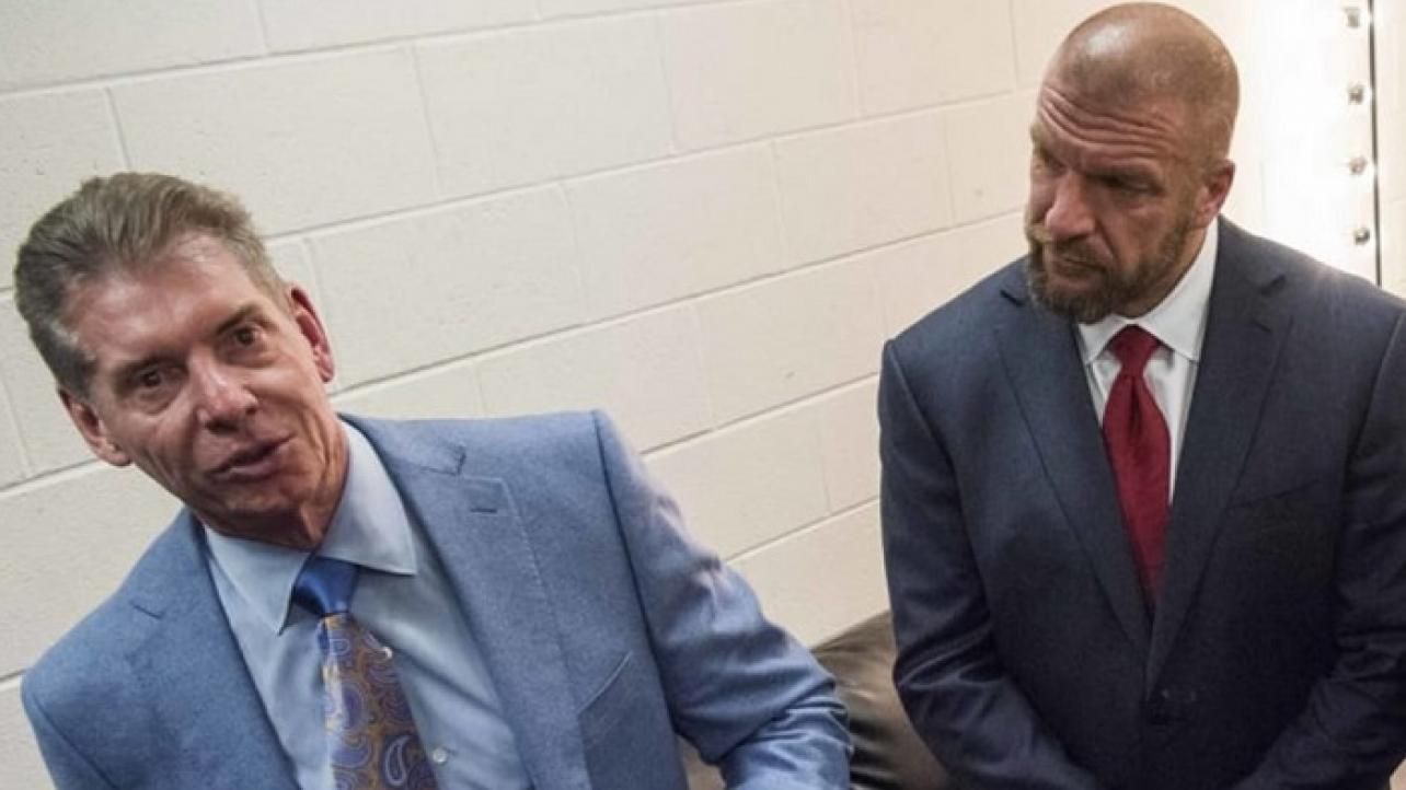 Vince McMahon (left) with Triple H (right)
